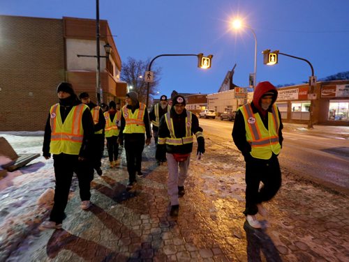 TREVOR HAGAN / WINNIPEG FREE PRESS The Bear Clan as they search the North End along Selkirk Avenue for Cooper Nemeth, the missing 17 year old, Saturday, February 20, 2016.