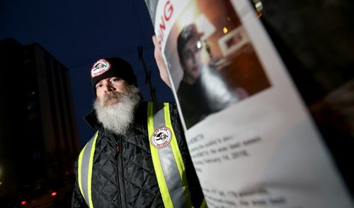 TREVOR HAGAN / WINNIPEG FREE PRESS Mitch Bourbonniere leads the Bear Clan as they search the North End for Cooper Nemeth, the missing 17 year old, Saturday, February 20, 2016.