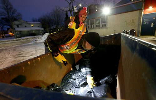 TREVOR HAGAN / WINNIPEG FREE PRESS Sgt. Pepper and Heather Baril, members of the Bear Clan as they search the North End for Cooper Nemeth, the missing 17 year old, Saturday, February 20, 2016.