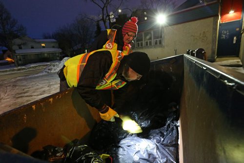 TREVOR HAGAN / WINNIPEG FREE PRESS Sgt. Pepper and Heather Baril, members of the Bear Clan as they search the North End for Cooper Nemeth, the missing 17 year old, Saturday, February 20, 2016.