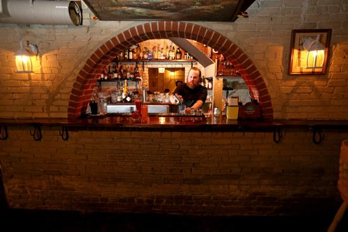 TREVOR HAGAN / WINNIPEG FREE PRESS Erik Thordarson pours drinks at Sous Sol in Osborne Village, Saturday, February 20, 2016. For Bartley restaurant review.