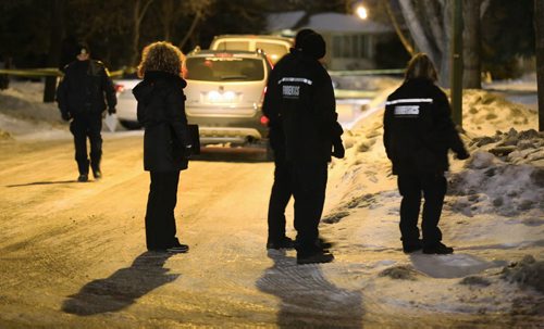 TREVOR HAGAN / WINNIPEG FREE PRESS Winnipeg Police Service Forensic Investigators at a large crime scene on Bayne Crescent in the early morning hours, Sunday, February 21, 2016.