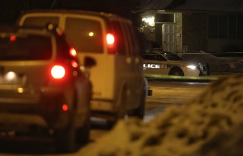 TREVOR HAGAN / WINNIPEG FREE PRESS Winnipeg Police Service Forensic Investigators at a large crime scene on Bayne Crescent in the early morning hours, Sunday, February 21, 2016.