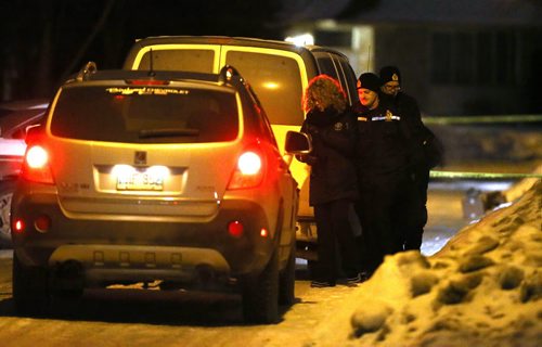 TREVOR HAGAN / WINNIPEG FREE PRESS Winnipeg Police and Forensic Investigators at a large crime scene on Bayne Crescent in the early morning hours of Sunday, February 21, 2016.