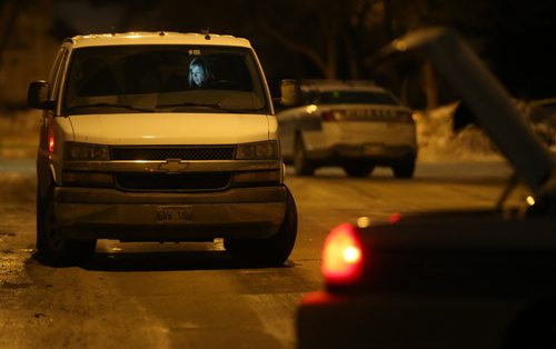 TREVOR HAGAN / WINNIPEG FREE PRESS Winnipeg Police and Forensic Investigators at a large crime scene on Bayne Crescent in the early morning hours of Sunday, February 21, 2016.
