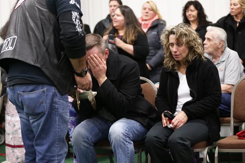 JOHN WOODS / WINNIPEG FREE PRESS Brent and Gaylene Nemeth, the parents of Cooper Nemeth, take part in a smudging ceremony facilitated by the Bear Clan at a memorial service for Cooper Nemeth and his family at Gateway Recreation Centre Monday, February 22, 2016. Cooper Nemeth was found murdered on Saturday.