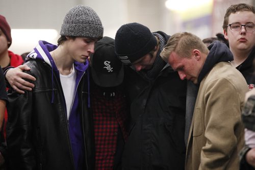 JOHN WOODS / WINNIPEG FREE PRESS Friends comfort eachother at a smudging memorial service for Cooper Nemeth and his family at Gateway Recreation Centre Monday, February 22, 2016. Cooper Nemeth was found murdered on Saturday.