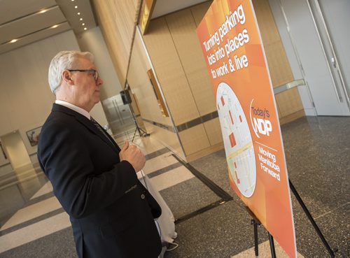 DAVID LIPNOWSKI / WINNIPEG FREE PRESS   NDP Manitoba Party Leader and Premier of Manitoba Greg Selinger makes a surface parking lot announcement flanked by  MLA's Flor Marcelino and Melanie Wight in the lobby of the RBC Convention Centre lobby Tuesday February 23, 2016.