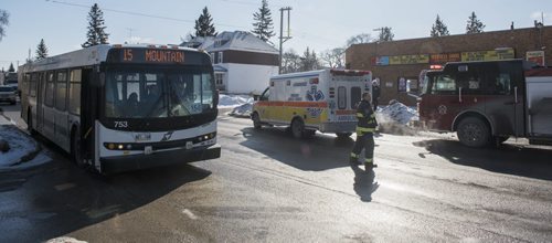 DAVID LIPNOWSKI / WINNIPEG FREE PRESS   Scene of a MVA reportedly involving a Transit bus at the intersection of Mountain Avenue and McGregor Street Tuesday February 23, 2016.