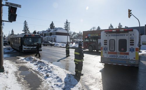 DAVID LIPNOWSKI / WINNIPEG FREE PRESS   Scene of a MVA reportedly involving a Transit bus at the intersection of Mountain Avenue and McGregor Street Tuesday February 23, 2016.