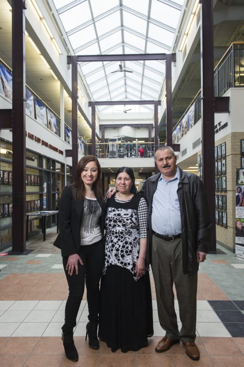 DAVID LIPNOWSKI / WINNIPEG FREE PRESS   Nafiya Naso (left) with mom Koulan Fandi and dad Enez Jallo at the Rady Jewish Community Centre Wednesday February 24, 2016.  The Yazidi refugees who live on Doncaster across the street from the Rady Centre were afraid to go there because they were raised to be scared of Jews. Now the couple go almost every day to swim and walk laps and the Jewish community is helping to sponsor Yazidi refugees from Iraq and Syria to come to Canada.