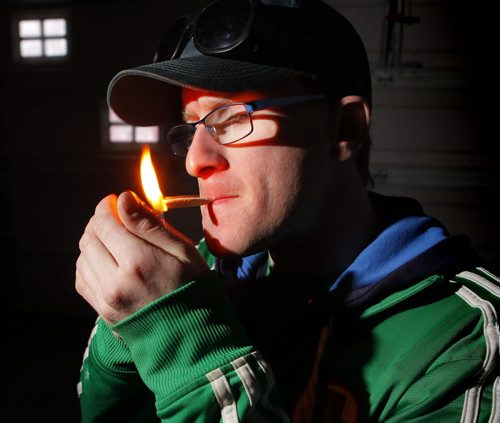 BORIS MINKEVICH / WINNIPEG FREE PRESS Steven Stairs smokes some home grown marijuana in his garage. He has glaucoma and is an advocate for medical marijuana rights. Photo taken February 24, 2016