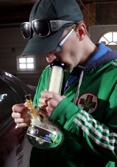 BORIS MINKEVICH / WINNIPEG FREE PRESS Steven Stairs smokes some home grown marijuana in his garage. He has glaucoma and is an advocate for medical marijuana rights. Photo taken February 24, 2016