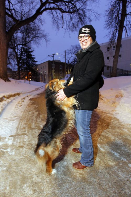 BORIS MINKEVICH / WINNIPEG FREE PRESS Nathalie Laliberte and her dog Sheba at one of 7 potential sites for city's first downtown dog park, green space at corner of assiniboine Ave & Donald St. Nathalie and her husband were at the city open house and are in favour of a downtown dog park - they own a home but not a car and would like to have some place close to let Sheba legally run off leash. For Sanders story. Photo taken February 24, 2016