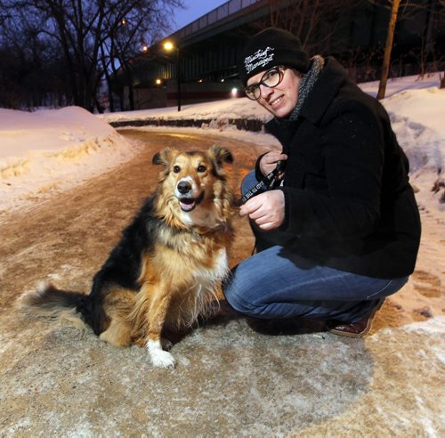 BORIS MINKEVICH / WINNIPEG FREE PRESS Nathalie Laliberte and her dog Sheba at one of 7 potential sites for city's first downtown dog park, green space at corner of assiniboine Ave & Donald St. Nathalie and her husband were at the city open house and are in favour of a downtown dog park - they own a home but not a car and would like to have some place close to let Sheba legally run off leash. For Sanders story. Photo taken February 24, 2016