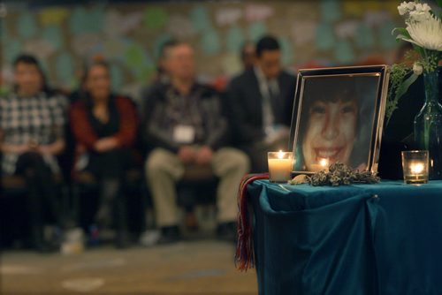 JOE BRYKSA / WINNIPEG FREE PRESS  Hundreds participated at the Second National Roundtable on Missing and Murdered Indigenous Women and Girls in Winnipeg Feb. 24 to 26, A large table with photos of the missing and victims was on a large table in the centre of the gathering, February 25, 2016.( See Alex Paul story)