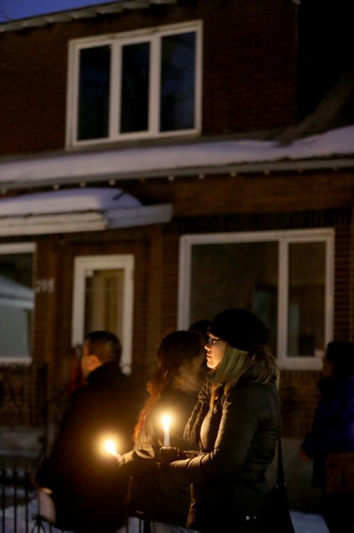 TREVOR HAGAN / WINNIPEG FREE PRESS Friends, family and supporters gather for a vigil in memory of Marilyn Rose Munroe, who was found dead inside her home on Pritchard Avenue earlier this week, Thursday, February 25, 2016.