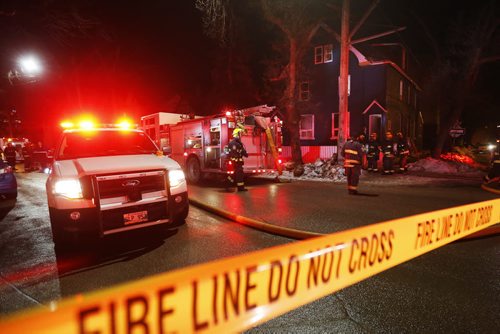 JOHN WOODS / WINNIPEG FREE PRESS Firefighters were called to 526/528 McDermott for a fire Friday, February 26, 2016.  One person was found dead in # 526.