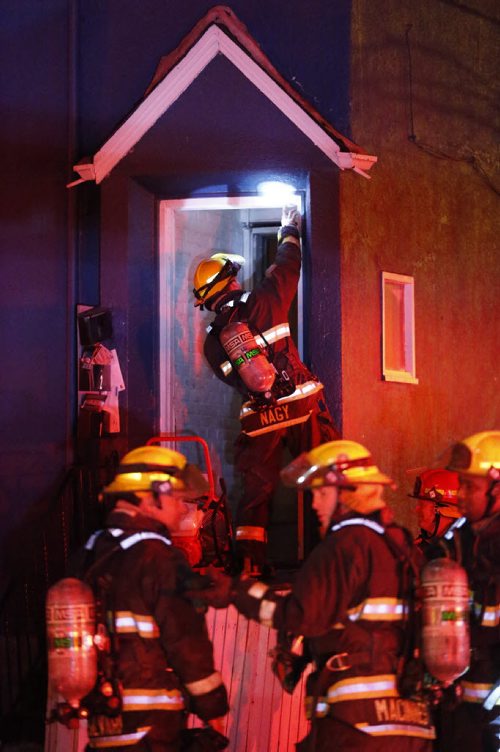 JOHN WOODS / WINNIPEG FREE PRESS Firefighters were called to 526/528 McDermott for a fire Friday, February 26, 2016. One person was found dead in # 526.
