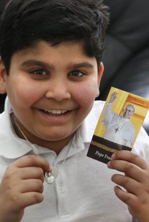 WAYNE GLOWACKI / WINNIPEG FREE PRESS
Grade 4 student Ryan K. had a chance to meet Pope Francis at the Vatican last week. He is holding a Pope Francis medallion he received on the trip.  Ryan was the only Canadian child chosen to meet the Pope in Rome to launch the Popes first childrens book, Dear Pope Francis. Bill Redekop story. February 29 2016.