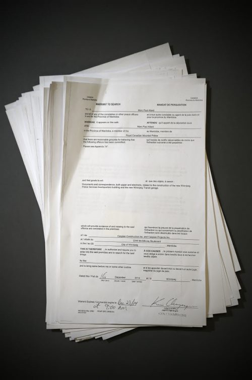JOHN WOODS / WINNIPEG FREE PRESS RCMP documents used to acquire a search warrant  at Caspian Construction, the company involved in the reconstruction of the Winnipeg Police headquarters photographed Monday, February 29, 2016.