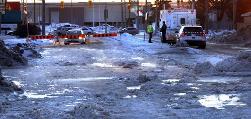 WAYNE GLOWACKI / WINNIPEG FREE PRESS  
A section of St. Matthews Ave. near Berry St. is still closed Tuesday morning  after a large water main break overnight. March 1 2016