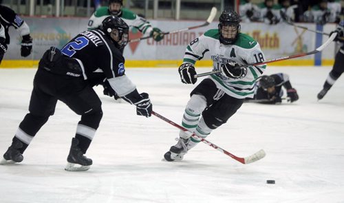 BORIS MINKEVICH / WINNIPEG FREE PRESS Highschool Hockey City championship @ the Iceplex. Oak Park vs Vincent Massey. Action: Raiders #2 Carson Cockwell tries to rob Trojans #18 Nolan Libbrecht. Photo taken February 29, 2016