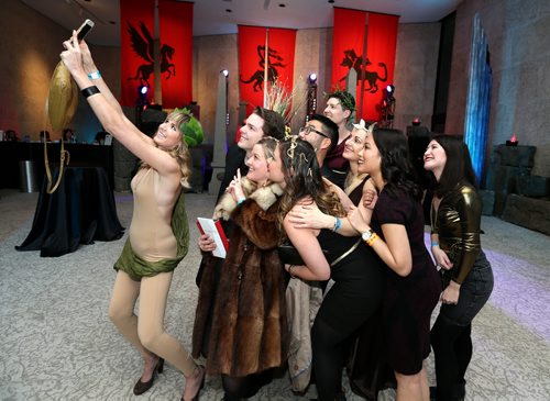 JASON HALSTEAD / WINNIPEG FREE PRESS  Organizing committee member Lindsay MacKenzie snaps a photo with other committee members at Art & Soul: Clash Of The Titans, the annual themed party event at the Winnipeg Art Gallery (WAG) on Feb. 20, 2016. All funds raised benefit the WAG. The event, themed around the current exhibit Olympus: The Greco-Roman Collections of Berlin, featured entertainment by Memetic DJs f(eaturing Nathan Zahn & Brent Produniuk), DJ Co-op, DJ Hunnicutt and the Lytics featuring DJ Zuki. (See Social Page)