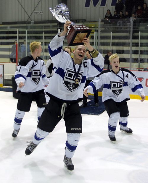 BORIS MINKEVICH / WINNIPEG FREE PRESS The Oak Park Raiders win the high school hockey championships at MTS IcePlex 3-2 over the Vincent Massey Trojans. Oak Park captain Marc Legare hoists the championship trophy after the Raiders downed the Vincent Massey Trojans to win the city championship. This was game 3 of the series. Photo taken March 02, 2016