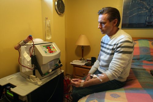 JOE BRYKSA / WINNIPEG FREE PRESS Blair Waldvogel, 50 years, on his dialysis in his home- He has been using it  for five years and is using the new machine that will hopefully be portable someday soon March 03, 2016.(See Joel Schlesinger story)