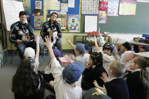 John Woods / Winnipeg Free Press / February 25, 2008 - 080225 - Jim Jackson (L) and Josh Prudden of the Manitoba Moose read to grade 2 students at the Immaculate Heart of Mary School on Flora Tuesday February 26, 2008.