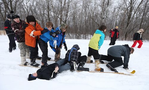 JASON HALSTEAD / WINNIPEG FREE PRESS  Members of the 1st Soutdale Scouts take part in the eight-person ski race as more than 300 Scouts tested their survival skills in Scouts Canadas annual Klondike Derby on March 5, 2016, at Camp Amisk south of Winnipeg. Teams of six to eight Cub Scouts, Scouts, Girl Guides and Pathfinders pulled a Klondike-style sleigh over a 2.5-kilometre course through the woods, competing at tasks including fire lighting, a flood disaster scenario and a simulated ice rescue.