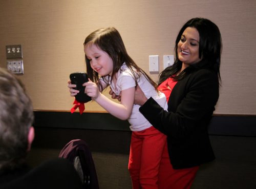 RUTH BONNEVILLE / WINNIPEG FREE PRESS Manitoba Liberal Leader Rana Bokhari lifts up five-year-old Rowan Powell a friends daughter at the Liberal AGM meeting Saturday evening at the Holiday Inn Polo Park.  See Larry Kusch story.  March 5, 2016