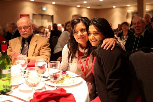 RUTH BONNEVILLE / WINNIPEG FREE PRESS Manitoba Liberal Leader Rana Bokhari shares some a hug  with Sandy Chahal after her speech at the Liberal AGM meeting Saturday evening at the Holiday Inn Polo Park.  See Larry Kusch story.  March 5, 2016