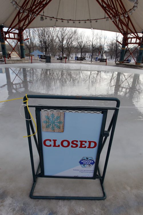 BORIS MINKEVICH / WINNIPEG FREE PRESS Skating at the Forks or the river trail is all but a memory as warm weather forced the trail to be closed. Workers have been removing all the benches and warm up huts. Here the rink under the canopy is melted. Photo taken March 07, 2016