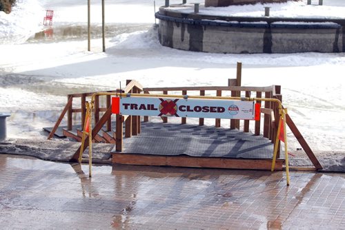 BORIS MINKEVICH / WINNIPEG FREE PRESS Skating at the Forks or the river trail is all but a memory as warm weather forced the trail to be closed. Workers have been removing all the benches and warm up huts. Photo taken March 07, 2016