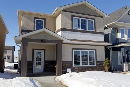 BORIS MINKEVICH / WINNIPEG FREE PRESS 144 Cherrywood Road in Bridgwater Trails. Ventura Custom Homes. Exterior from the front. Photo taken March 07, 2016