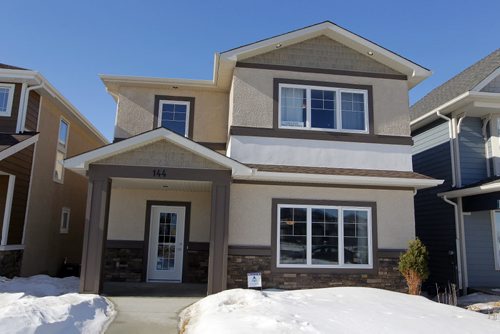 BORIS MINKEVICH / WINNIPEG FREE PRESS 144 Cherrywood Road in Bridgwater Trails. Ventura Custom Homes. Exterior from the front. Photo taken March 07, 2016