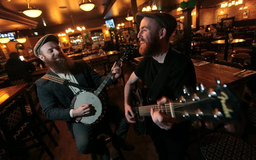 PHIL HOSSACK / WINNIPEG FREE PRESS Irish musicians Ross  (left) and Mike O'Hanlon Monday evening at Fionn MacCool's. See Dave Sanderson's St Patrick's Day feature. March 7, 2016