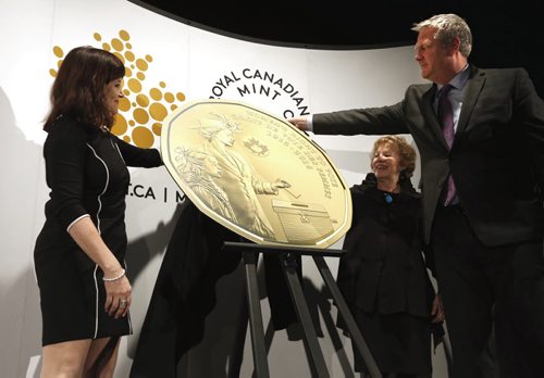 WAYNE GLOWACKI / WINNIPEG FREE PRESS From right, Dr. John Young, CEO, Canadian Museum for Human Rights, Lila Goodspeed, Chair, The Nellie McClung Foundation and Bonnie Staples-Lyon, Director, Royal Canadian Mint Board of Directors unveiedl the design of the new $1 circulation coin celebrating the 100th anniversary of a milestone in the history of womens right to vote in Canada. The event was held at the Canadian Museum for Human Rights Tuesday. Ashley Prest story March 8 2016
