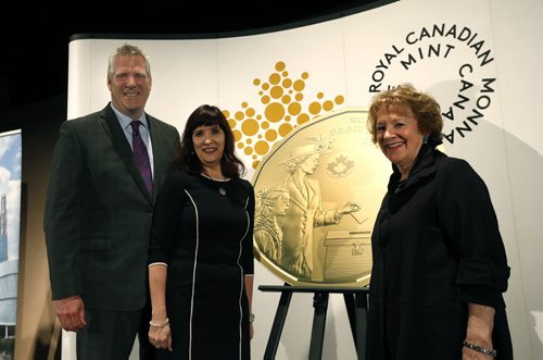 WAYNE GLOWACKI / WINNIPEG FREE PRESS From right, Lila Goodspeed, Chair, The Nellie McClung Foundation, Bonnie Staples-Lyon, Director, Royal Canadian Mint Board of Directors and Dr. John Young, CEO, Canadian Museum for Human Rights unveiled the design of the new $1 circulation coin celebrating the 100th anniversary of a milestone in the history of womens right to vote in Canada. The event was held at the Canadian Museum for Human Rights Tuesday. Ashley Prest story March 8 2016