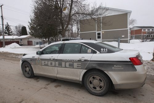 JOE BRYKSA / WINNIPEG FREE PRESS  Police outside 64 Allenby Cres scene of homicide late Tuesday evening March 09, 2016.(See Bill Redekop story)