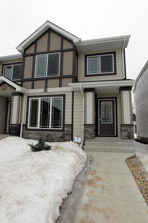 BORIS MINKEVICH / WINNIPEG FREE PRESS 68 Danakas Drive (The Atwood Lane Townhomes) in Transcona. Curb view. Photo taken March 09, 2016