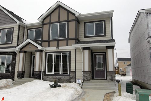 BORIS MINKEVICH / WINNIPEG FREE PRESS 68 Danakas Drive (The Atwood Lane Townhomes) in Transcona. Curb view. Photo taken March 09, 2016