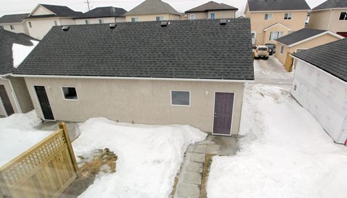 BORIS MINKEVICH / WINNIPEG FREE PRESS 68 Danakas Drive (The Atwood Lane Townhomes) in Transcona. Each townhouse has its own half garage. Photo taken March 09, 2016