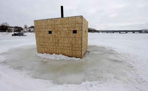 WAYNE GLOWACKI / WINNIPEG FREE PRESS The warm temperatures are causing the ice conditions across much of southern Manitoba to deteriorate faster than normal this spring, Manitoba Conservation and Water Stewardship urges anyone with an ice shack on a lake or river in southern Manitoba to remove the structure as soon as possible, as long as ice conditions are safe to do so. This is one of the few ice fishing shacks that remain on the Red River north of Lockport Thursday. The last day for removal of ice shacks in the south normally March 31, but this season all ice-fishing shacks are to be moved off the Red River by March 13. Anglers are asked to have shacks in the area south of Riding Mountain National Park, as well as those on Lake of the Prairies, Dauphin Lake, Moose Lake and Buffalo Bay in the Lake of the Woods off the ice by March 15. SEE RELEASE   March 10 2016
