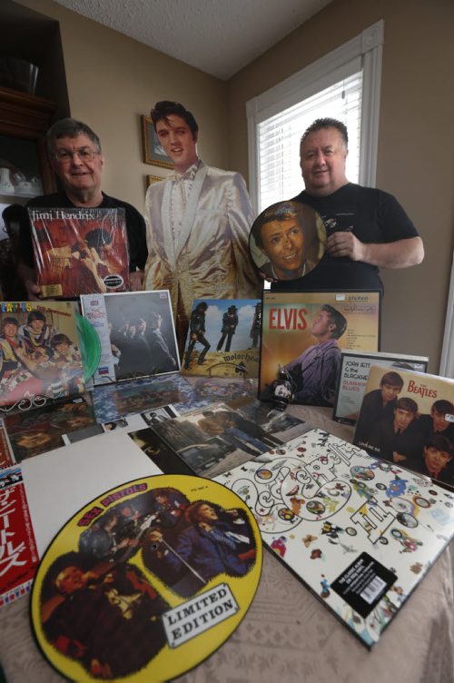 WAYNE GLOWACKI / WINNIPEG FREE PRESS  49.8 Intersection story on the 16-year history of Rockin' Richard's Record & CD Show & Sale.From left, Richard Sturtz, a cutout of Elvis and Alex Reid with some of their music collectables on Richard's dining room table. Dave Sanderson story.  March 10 2016