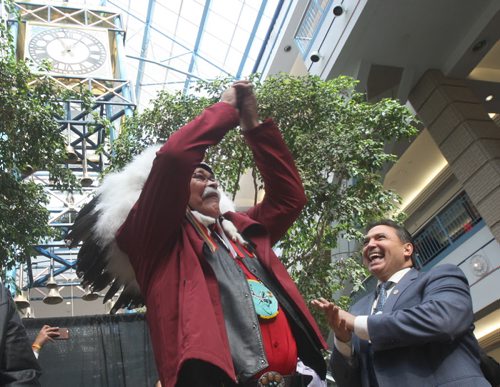 JOE BRYKSA / WINNIPEG FREE PRESS  Veteran - Elder Joseph Meconse was kicked out of Portage Place in Feb of this year, today there was a gathering in the mall to honour the elder- Here  he claims victory to the crowd in mall next to AFN National Chief Perry Bellegarde -  March 11, 2016.(See Jen Zoratti story)