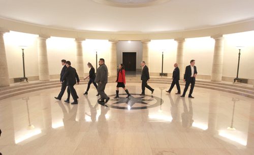 RUTH BONNEVILLE / WINNIPEG FREE PRESS  A group of Liberal candidates, led by St. Johns candidate Noel Bernier, make their way across the - pool of the black star room on the main level of the Manitoba Legislative building after holding a press conference speaking out against Wab Kinew's  tweets Friday.    March 11, 2016