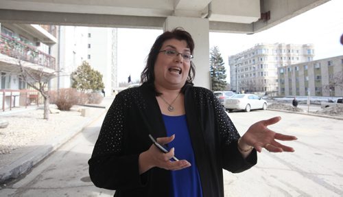 RUTH BONNEVILLE / WINNIPEG FREE PRESS  St. Vital PC candidate, Colleen Mayer answers questions from the press on allegations about using Green Team employees to plant flowers at her home residence outside a seniors complex in St. Vital Friday.    March 11, 2016